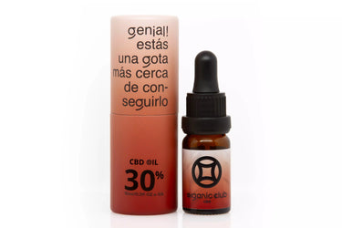 aceite de acbd del 30% con envase rojo sobre fondo blanco