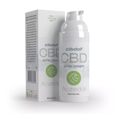 crema de cbd anti acné en fondo blanco con su correspondiente caja