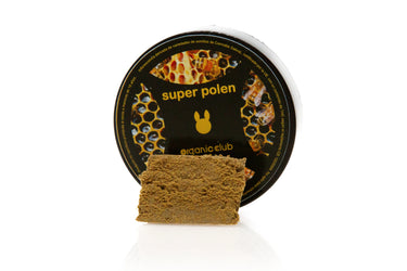 pieza de hachis de CBD doble zero, con su envase de fondo