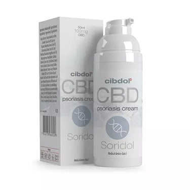 crema para la psoriasis de cbd junto con su caja en fondo blanco