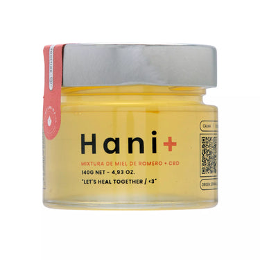 tarro de cristal con contenido de miel y cbd