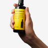 Envase de aceite corporal de CBD en fondo blanco. Organic Club envío discreto España