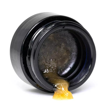 wax en su envase sobre fondo blanco