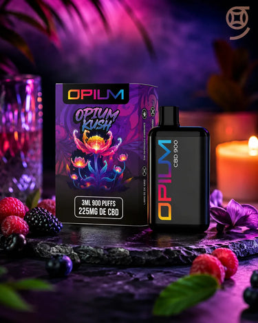 vape desechable opium  con su caja original con fondo morado lleno de frutos rojos